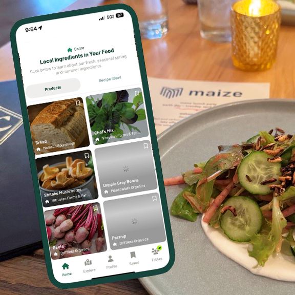 The background photo shows a plate with salad on it. In the foreground is an iPhone with a still from the "Maize" app.