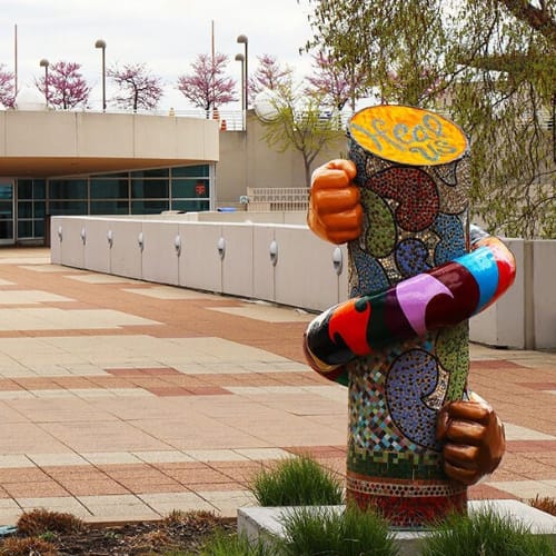 A sculpted piece of art stands before the rooftop entrance of the Monona Terrace.